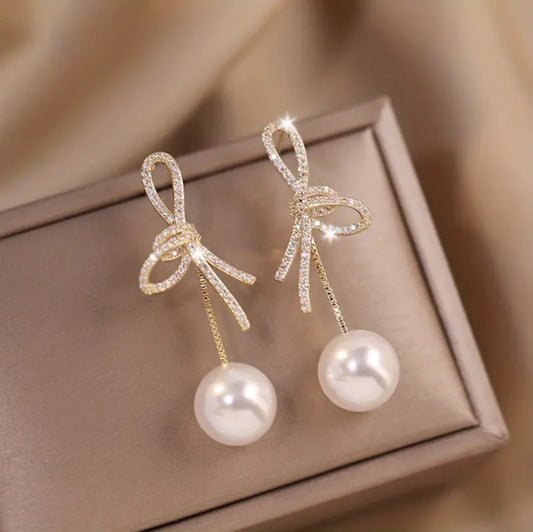 Bow Pearl Dangle Earrings